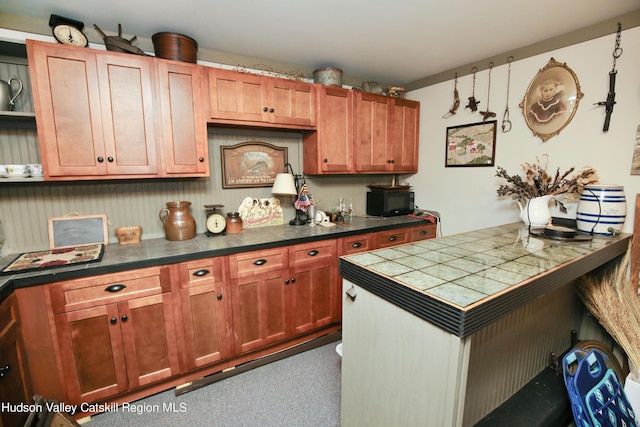 199 Echo Hill Rd, Saugerties, NY 12477 - kitchen featuring carpet floors, tile countertops, open shelves, and a peninsula