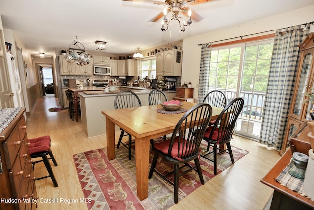 199 Echo Hill Rd, Saugerties, NY 12477 - dining room featuring a ceiling fan and light wood finished floors