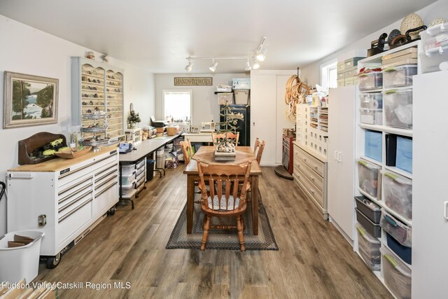 199 Echo Hill Rd, Saugerties, NY 12477 - dining space with track lighting, plenty of natural light, and dark wood finished floors