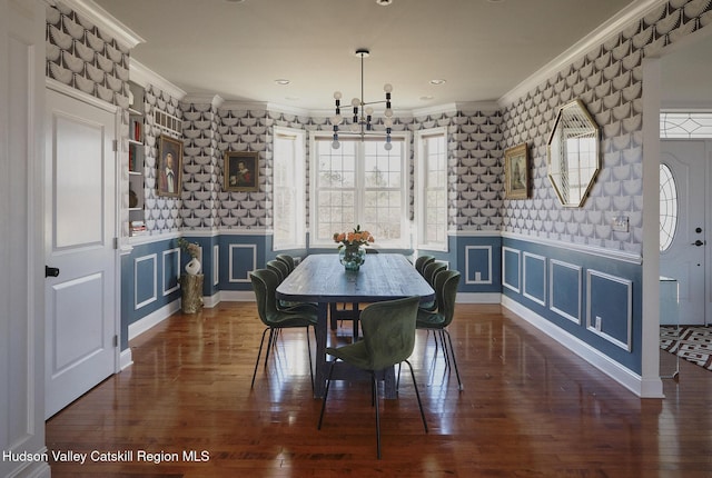 dining area featuring a wainscoted wall, plenty of natural light, ornamental molding, and dark wood-type flooring