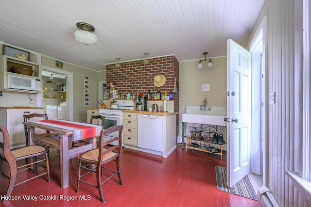 1250 County Route 351, Rensselaerville, NY 12147 - dining space featuring washer and dryer and wood finished floors