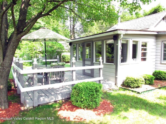 70 Watson Hollow Rd, West Shokan, NY 12494 - view of side of property with a sunroom, a wooden deck, and roof with shingles