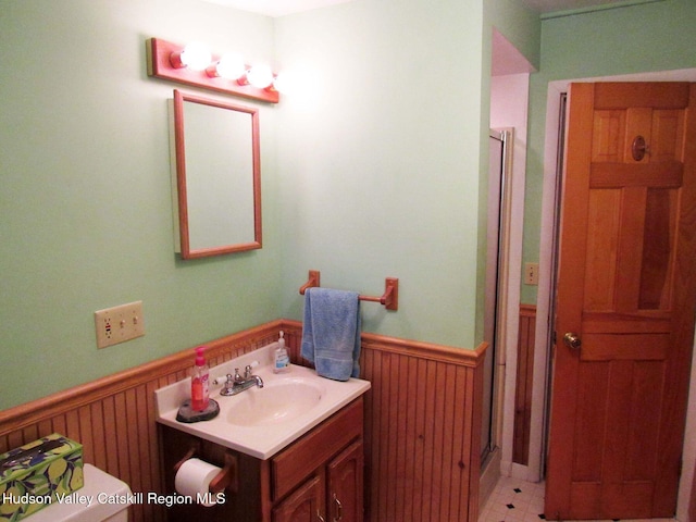 70 Watson Hollow Rd, West Shokan, NY 12494 - bathroom with wainscoting, vanity, and a shower with shower door