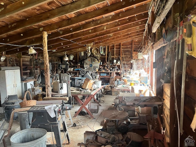 misc room with a workshop area