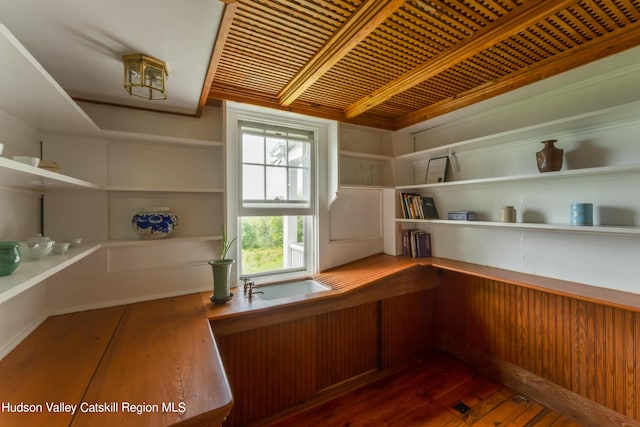 unfurnished office with dark wood-type flooring