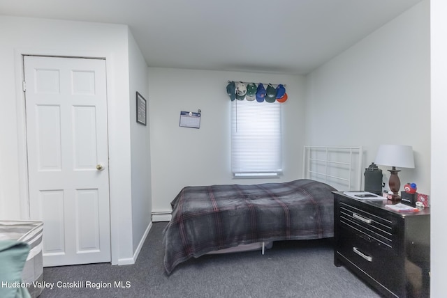 carpeted bedroom with baseboards and baseboard heating