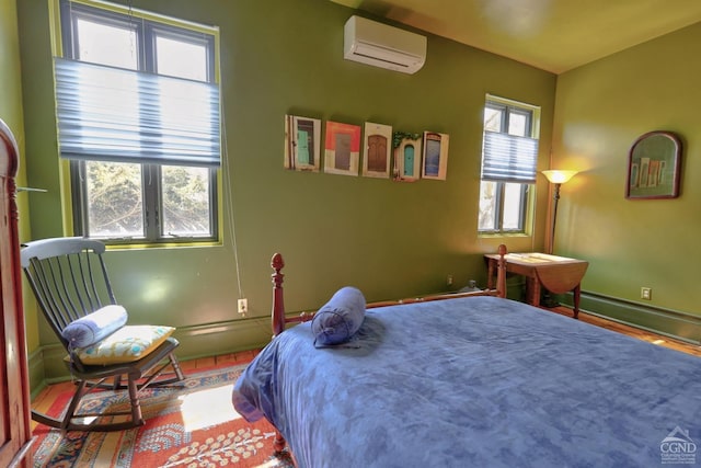 380 Main St, New Baltimore, NY 12124 - bedroom with a wall mounted AC and baseboards