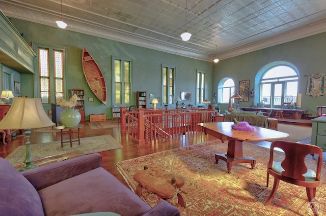 380 Main St, New Baltimore, NY 12124 - living room featuring wood finished floors, ornamental molding, and french doors