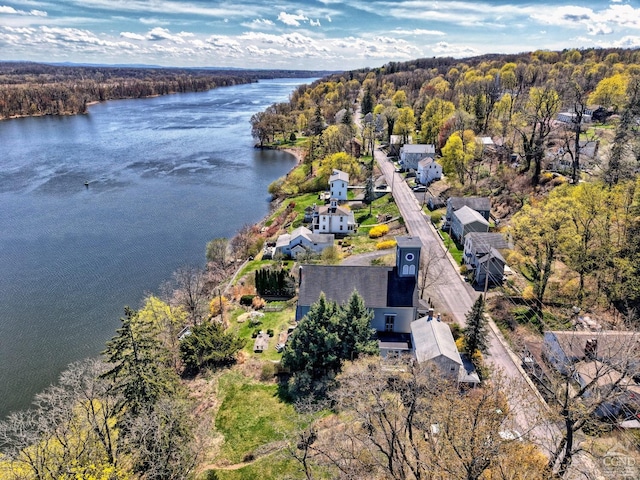 380 Main St, New Baltimore, NY 12124 - aerial overview of property's location featuring a nearby body of water and a heavily wooded area