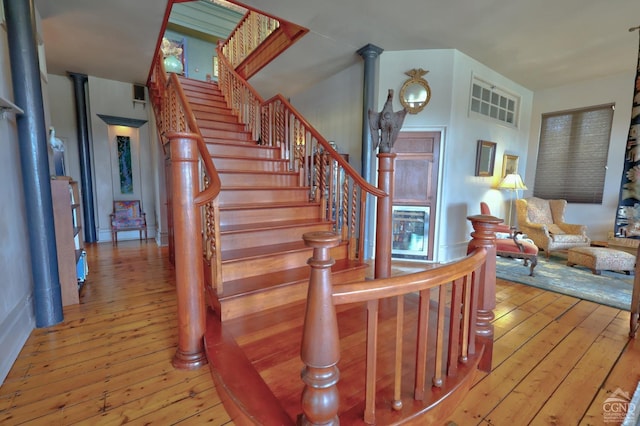 380 Main St, New Baltimore, NY 12124 - staircase featuring hardwood / wood-style floors