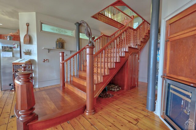 380 Main St, New Baltimore, NY 12124 - staircase featuring hardwood / wood-style floors