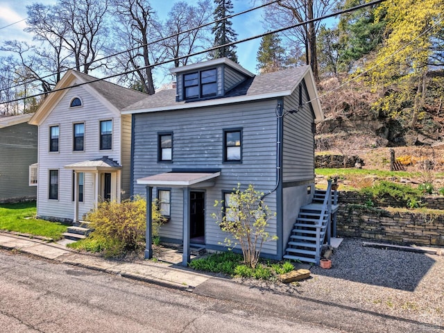 380 Main St, New Baltimore, NY 12124 - view of front of property featuring roof with shingles and stairway