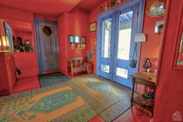 380 Main St, New Baltimore, NY 12124 - entryway featuring wood finished floors, french doors, and baseboards