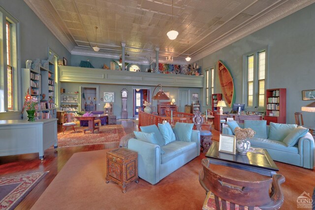 380 Main St, New Baltimore, NY 12124 - living area with crown molding, healthy amount of natural light, and wood finished floors
