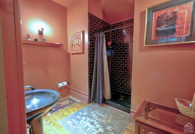 380 Main St, New Baltimore, NY 12124 - full bath with a shower stall, wood finished floors, and vaulted ceiling