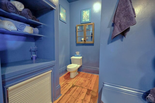 380 Main St, New Baltimore, NY 12124 - half bath with hardwood / wood-style flooring and toilet
