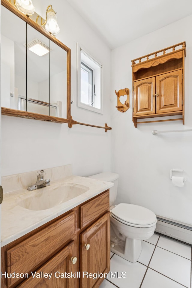 109 Union St, Middleburgh, NY 12122 - bathroom with baseboard heating, vanity, and tile patterned flooring