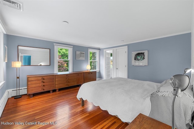370 N Elting Corners Rd, Highland, NY 12528 - bedroom featuring wood finished floors, crown molding, and baseboards