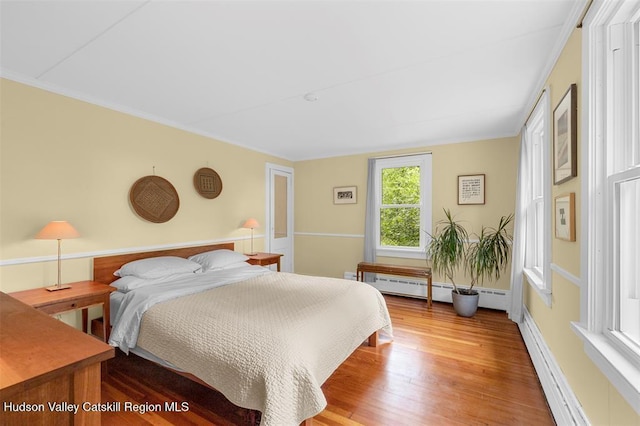 370 N Elting Corners Rd, Highland, NY 12528 - bedroom with wood finished floors and ornamental molding