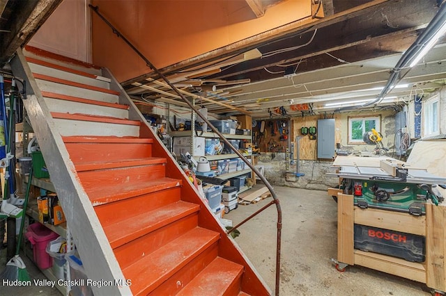 370 N Elting Corners Rd, Highland, NY 12528 - basement featuring a workshop area, stairway, and electric panel