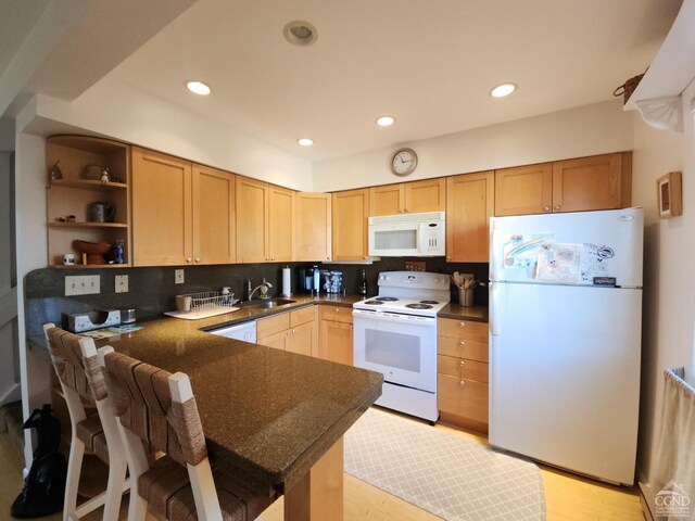 56 Highlands Dr Unit F-5, Hunter, NY 12442 - kitchen featuring white appliances, a peninsula, recessed lighting, open shelves, and decorative backsplash
