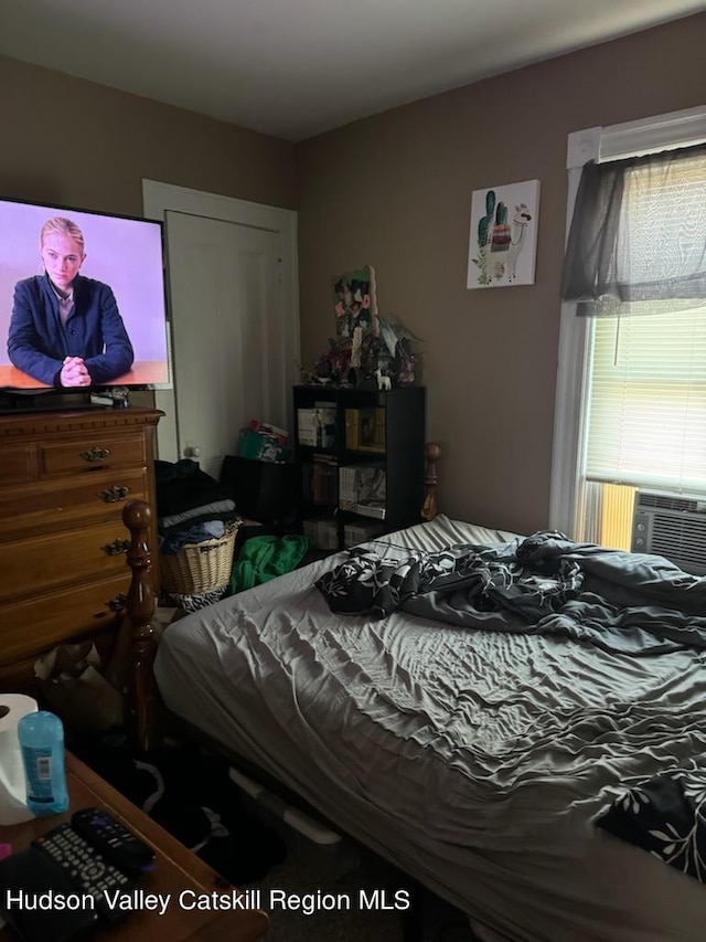 bedroom featuring cooling unit