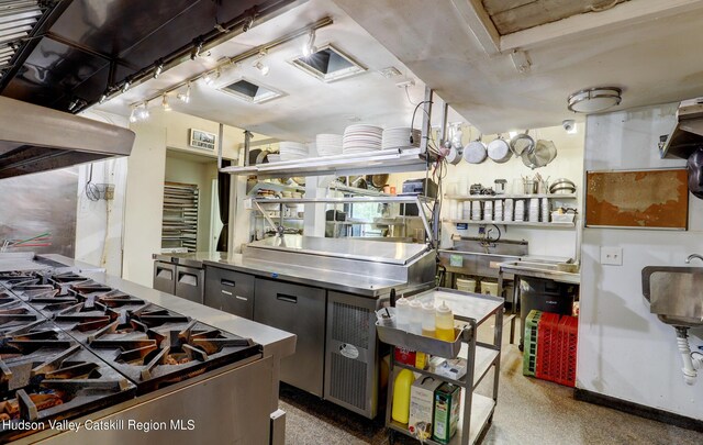 kitchen with stainless steel counters and stainless steel range