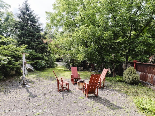 view of patio / terrace with a fire pit