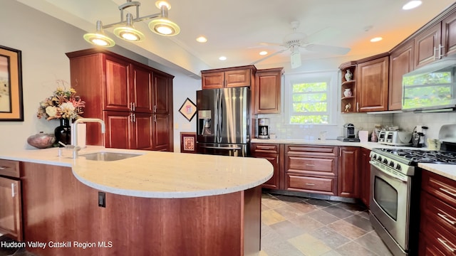 50 Manhattoes Dr, Athens, NY 12015 - kitchen featuring stainless steel appliances, a sink, backsplash, ceiling fan, and recessed lighting