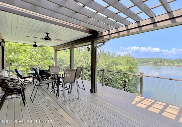 50 Manhattoes Dr, Athens, NY 12015 - wooden terrace with a water view, a pergola, outdoor dining area, and a ceiling fan