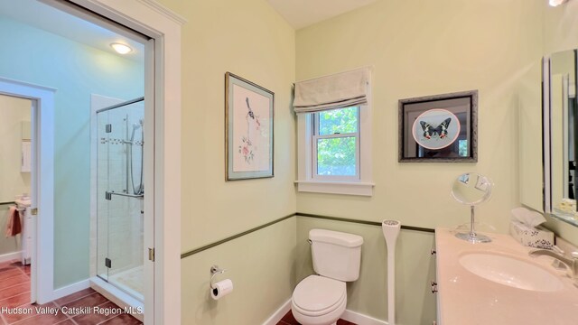50 Manhattoes Dr, Athens, NY 12015 - full bath with a stall shower, toilet, vanity, and tile patterned flooring