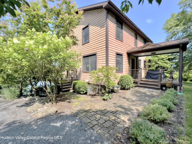 50 Manhattoes Dr, Athens, NY 12015 - view of front of house with a deck