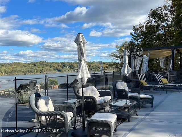 view of patio / terrace featuring a water view