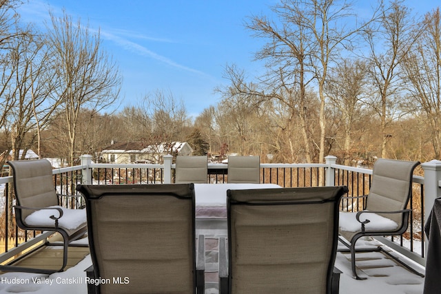 view of snow covered deck