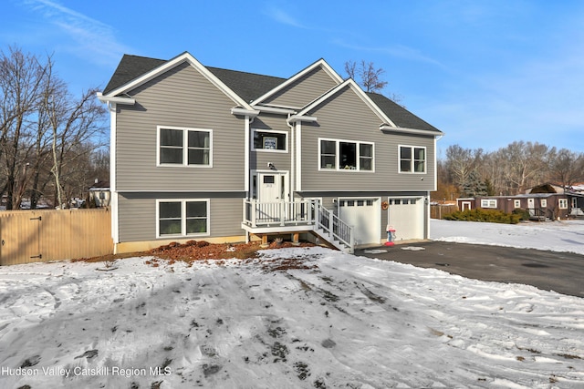 bi-level home featuring a garage