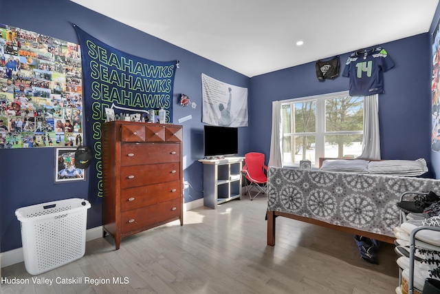 bedroom featuring light hardwood / wood-style flooring