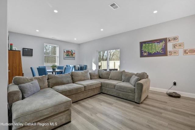 living room featuring light wood-type flooring