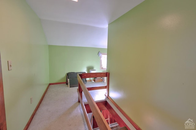 568 State Route 145, Middleburgh, NY 12122 - hall with baseboards, carpet flooring, vaulted ceiling, and healthy amount of natural light