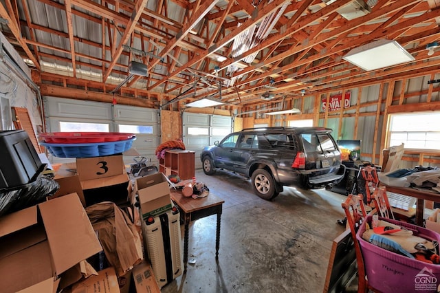 568 State Route 145, Middleburgh, NY 12122 - garage featuring a garage door opener