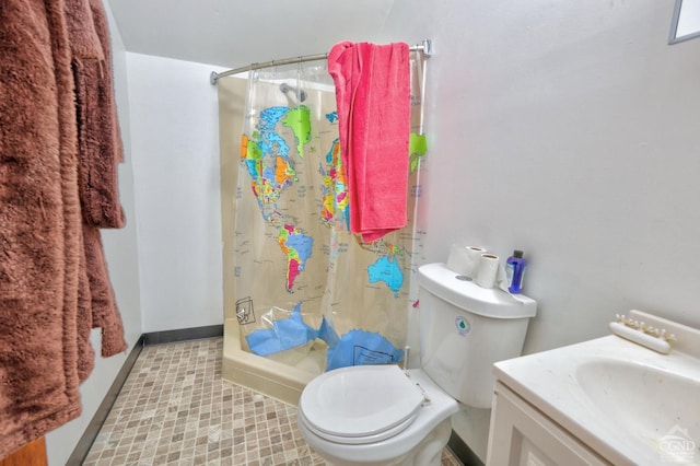 568 State Route 145, Middleburgh, NY 12122 - full bathroom with a stall shower, toilet, baseboards, and vanity