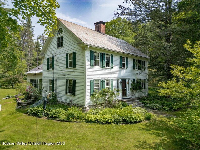 21 Cemetery Rd, New Lebanon, NY 12125 - view of front of home featuring a chimney