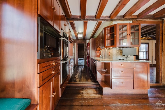 21 Cemetery Rd, New Lebanon, NY 12125 - kitchen featuring dark wood-style flooring, a sink, black microwave, glass insert cabinets, and beamed ceiling