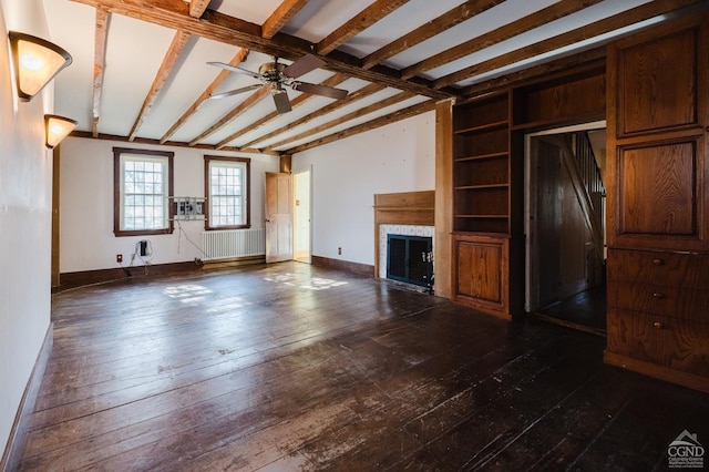 21 Cemetery Rd, New Lebanon, NY 12125 - unfurnished living room featuring radiator heating unit, ceiling fan, dark wood-type flooring, a fireplace, and baseboards
