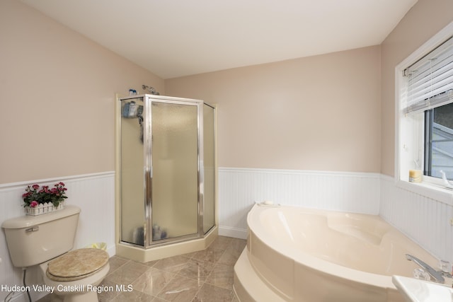 368 Gahbauer Rd, Hudson, NY 12534 - bathroom featuring a stall shower, a bath, a wainscoted wall, and marble finish floors