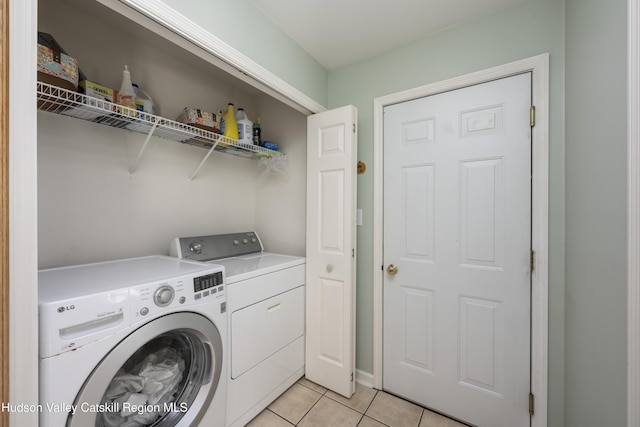 368 Gahbauer Rd, Hudson, NY 12534 - washroom with separate washer and dryer and light tile patterned floors