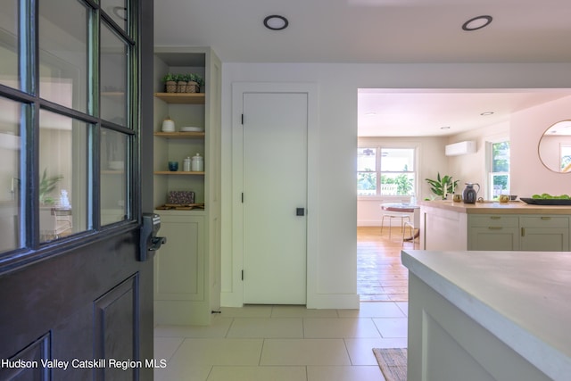 pantry with a wall unit AC