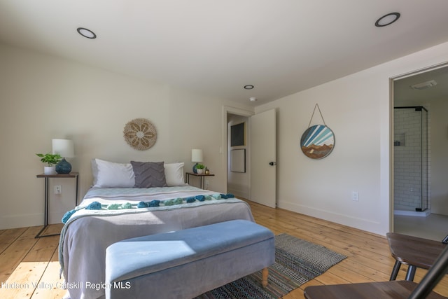 bedroom with light hardwood / wood-style floors