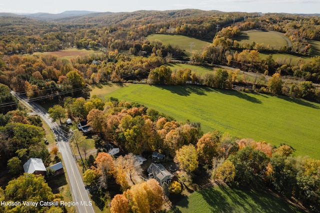 birds eye view of property featuring a rural view