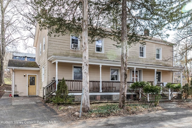 multi unit property featuring covered porch