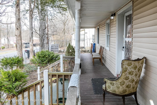 wooden deck featuring a porch